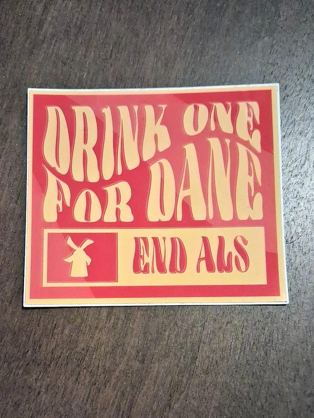 Dutch Bros Drink One for Dane End ALS Sticker Red & Cream